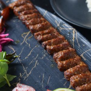 250 گرم گوشت گوسفندی، گوجه کبابی،