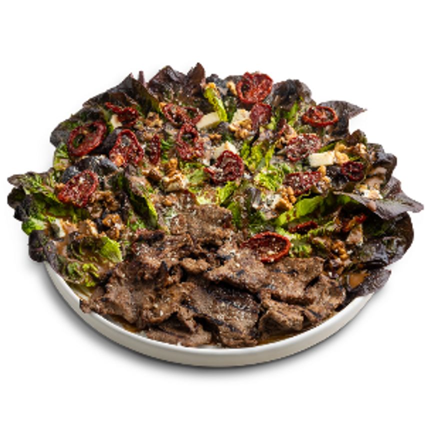 120 گرم راسته‌ی گوساله‌ی رست، کاهو، پنیر لیقوان ، گوجه‌ی خشک، بی‌بی اسفناج، پیاز کاراملایز، مغزیجات رست، سس قهوه بالزامیک